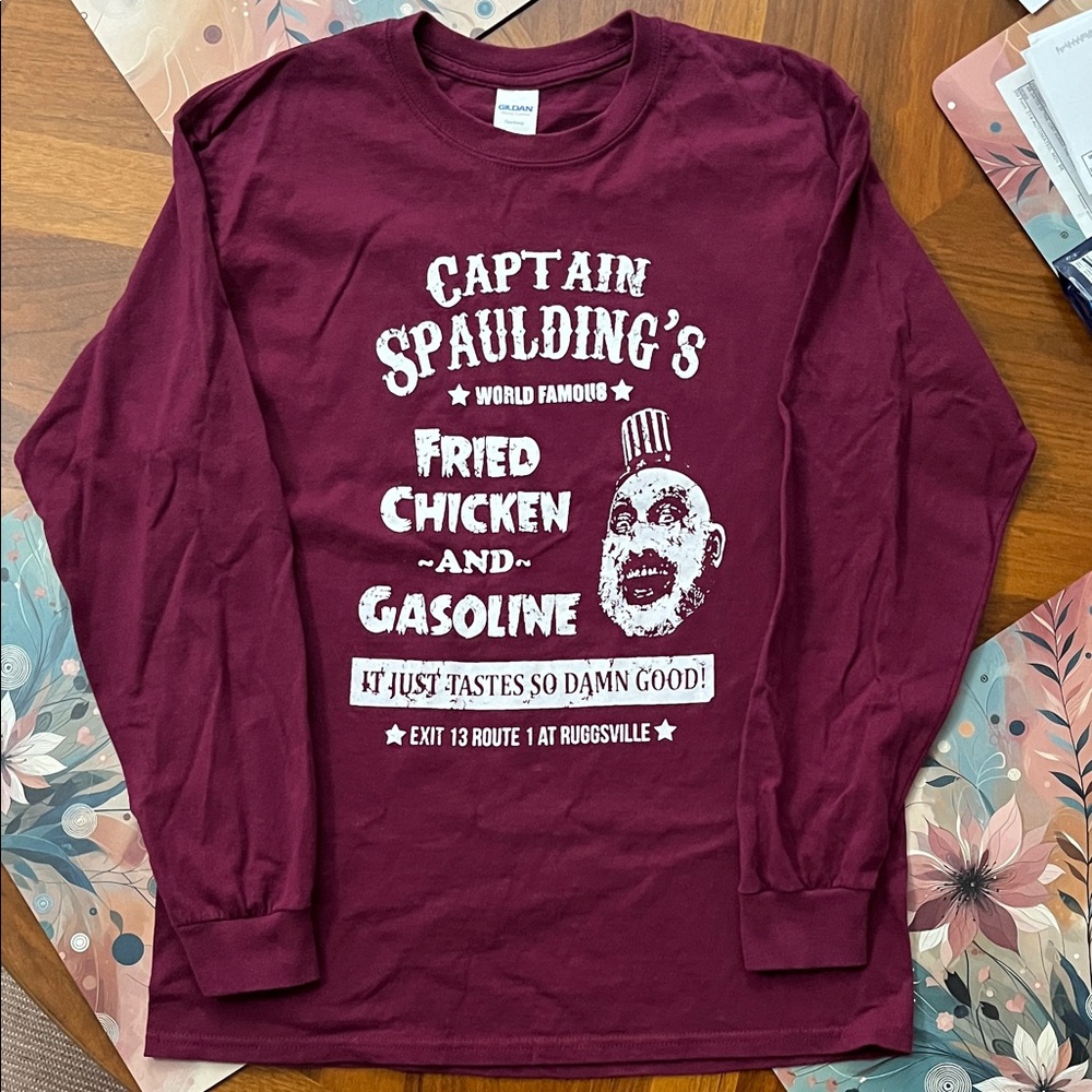 Captain Spaulding's Unisex Maroon Long Sleeve Shirt!